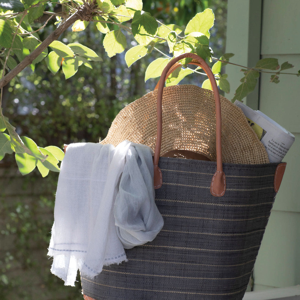 Our mosquito-repellent Gardenia shawl is packed in a beach tpte, ready to go. Insect Shield permethrin is bound to the fibers of the scarf and is effective for 70 washings. Invisible mosquito protection. An Oprah favorite.